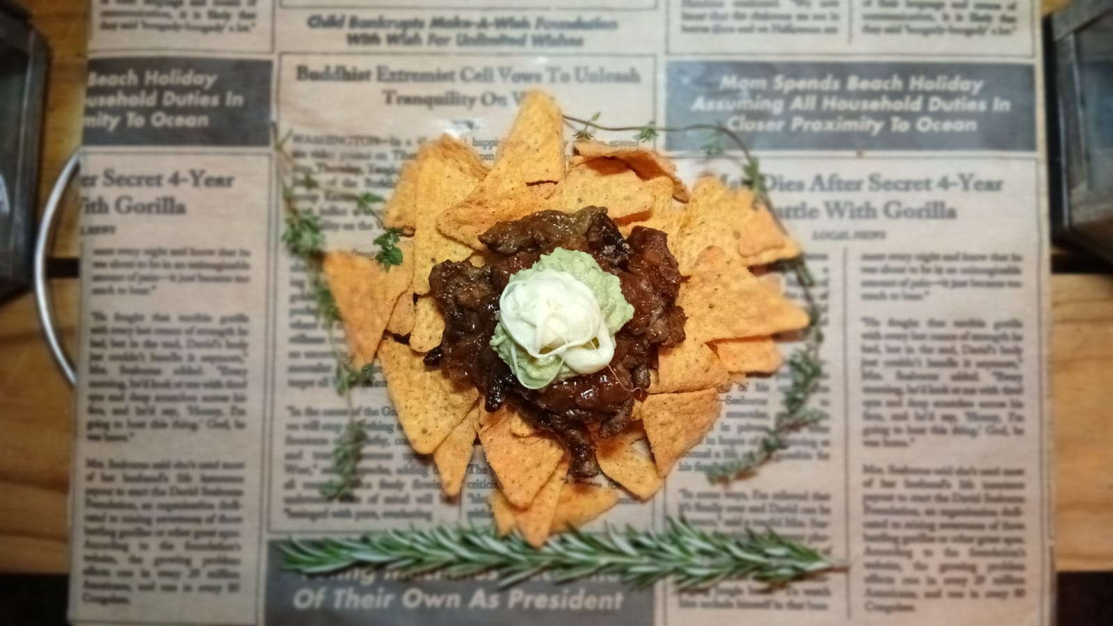 Doritos chaat piled with slow-cooked steak and finished with fresh herbs