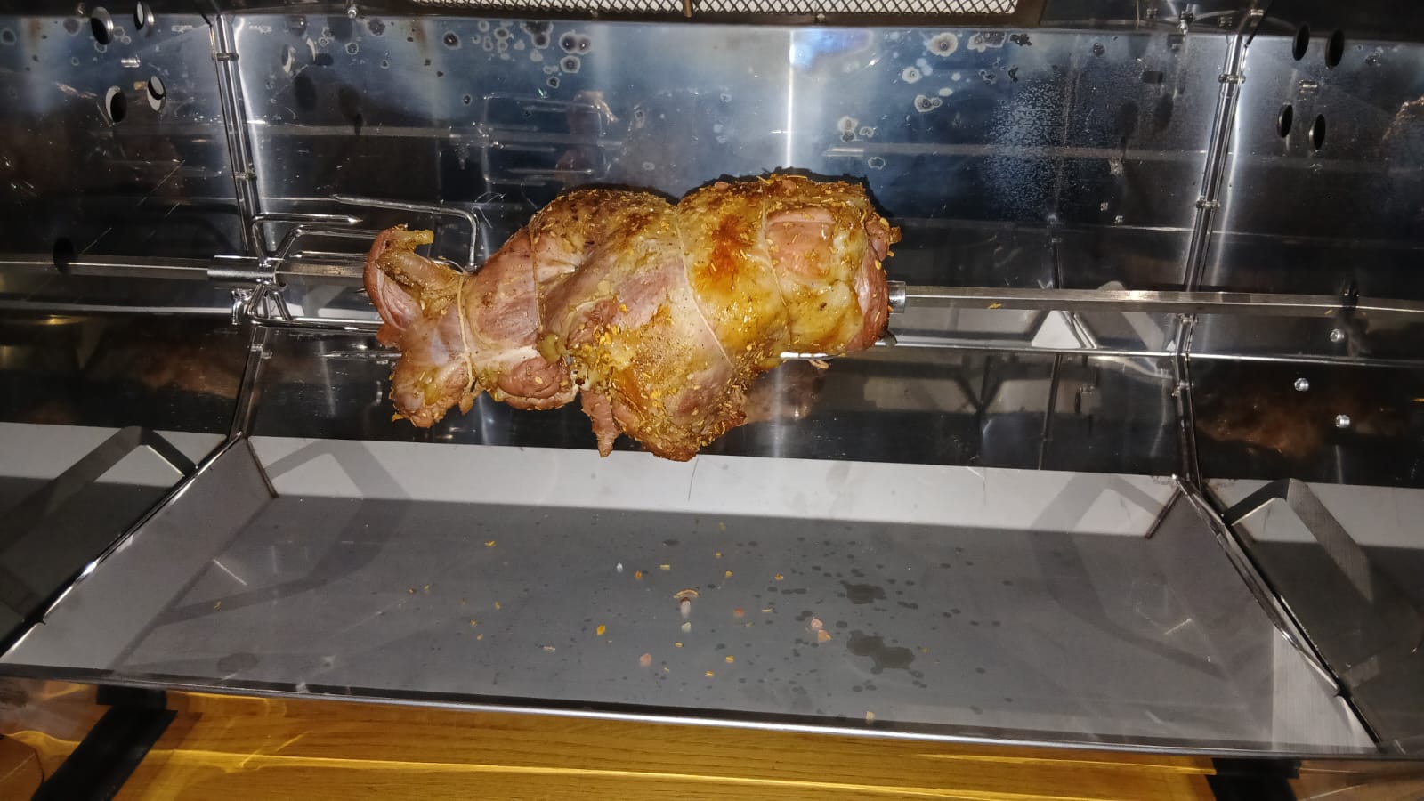 Lamb leg roasting on the spit