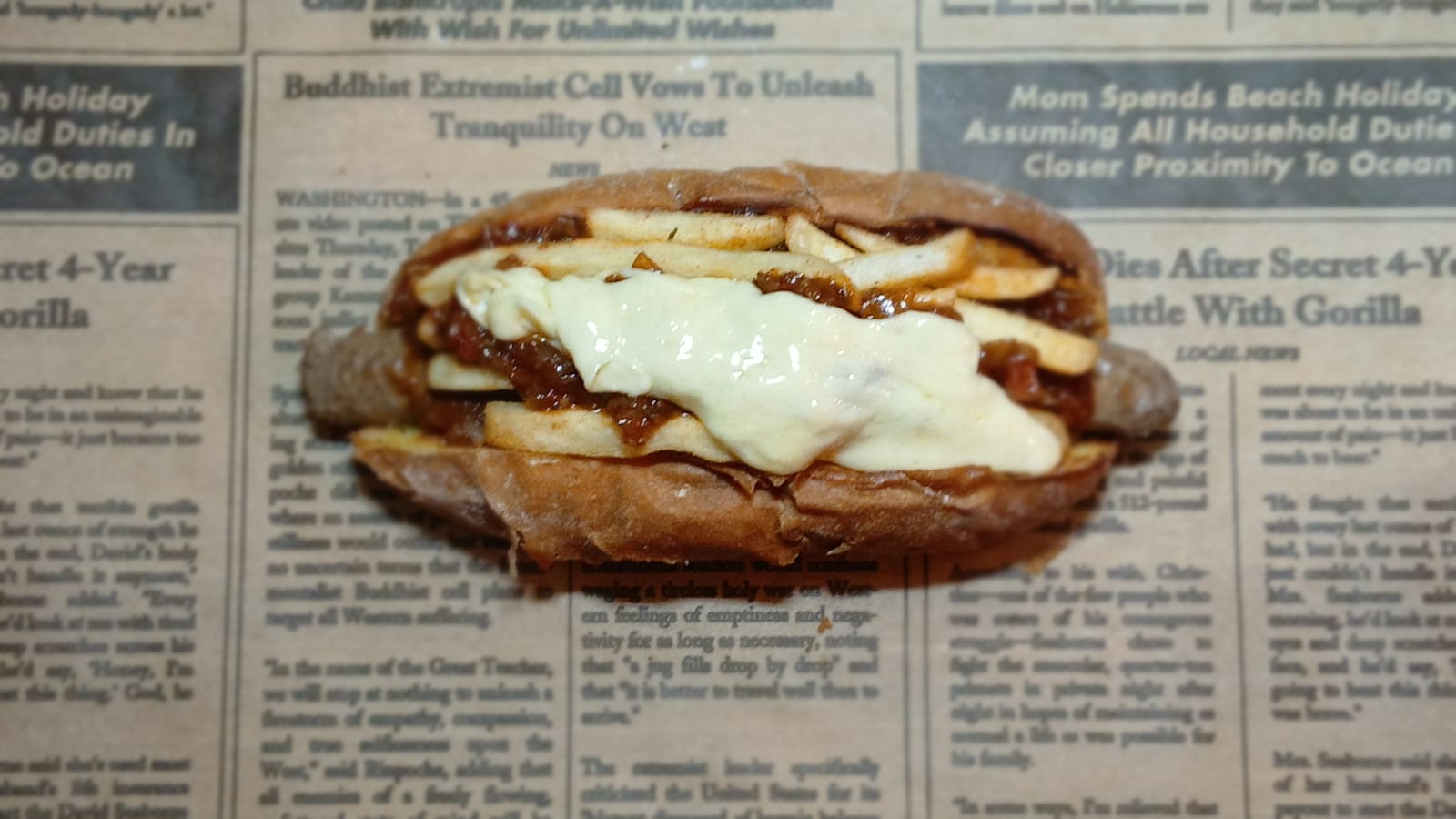 Loaded boerie roll with relish, chips and cheese sauce
